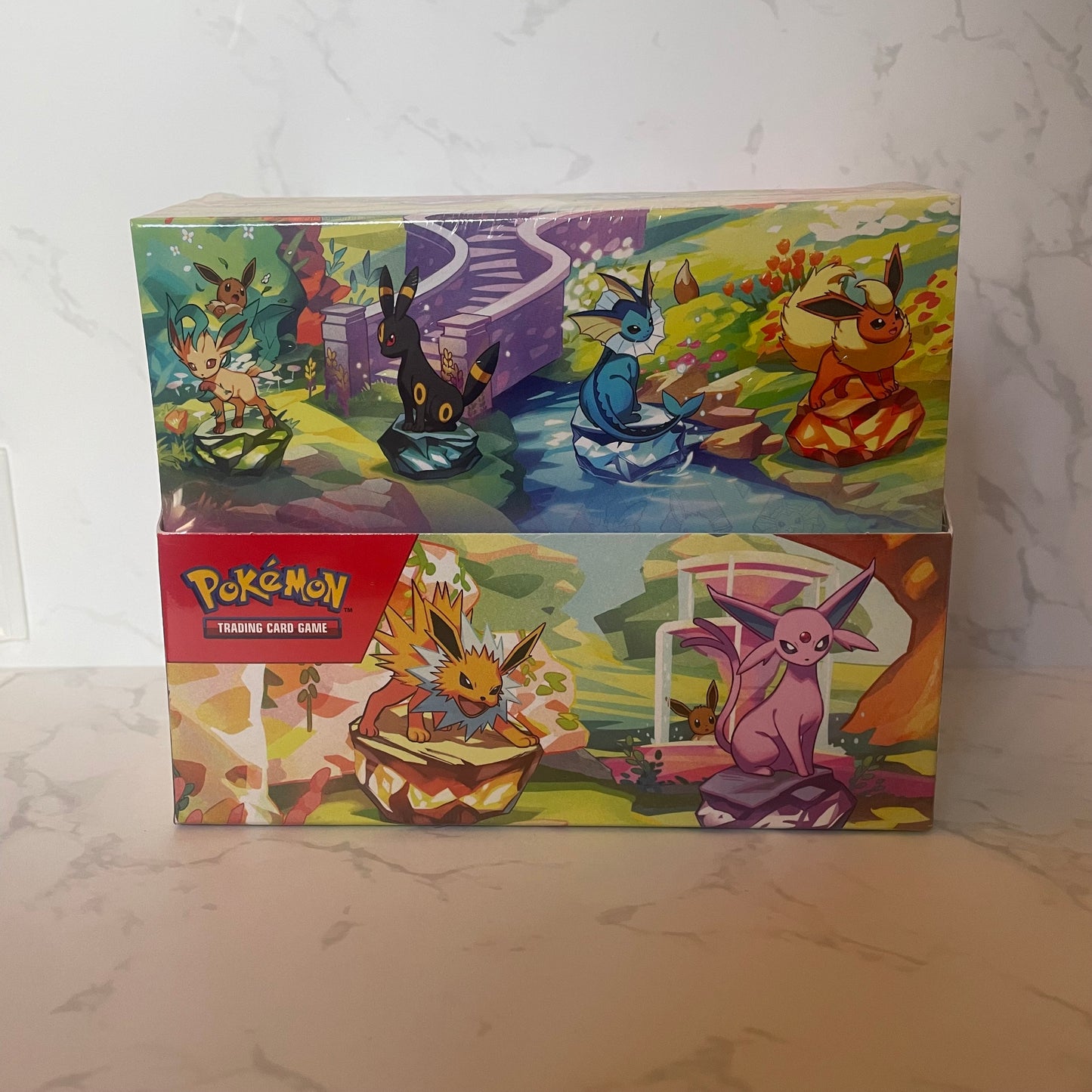 Prismatic Evolutions Sealed Mini Tin Display